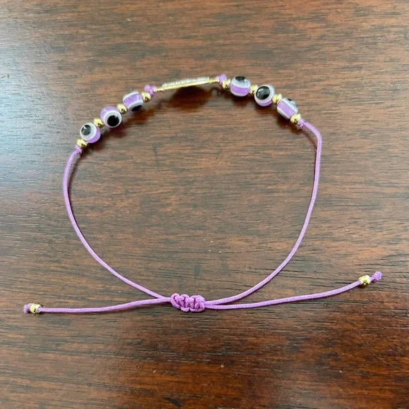 Evil eye purple bead gold tone adjustable bracelet - Picture 4 of 5